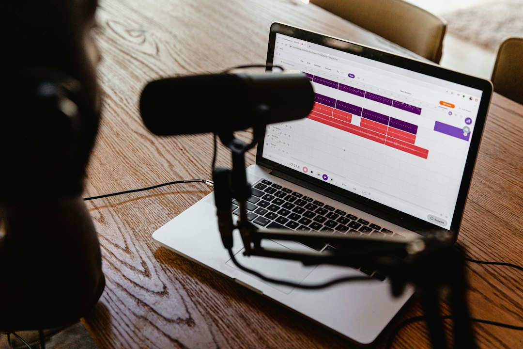 Microphone and laptop arranged for an audio recording